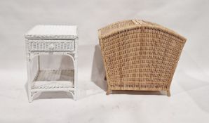 Canework double laundry basket and a white painted cane occasional table with drawer and