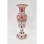 Late 19th/early 20th century Bohemian glass vase with white overlay cut back to cranberry glass,