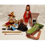 Collection of early carved and painted wood and cloth puppets to include Mr. Punch, Judy, devil,