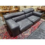 Natuzzi black leather sofa unit comprising of two chairs, one 116cm wide and one 100cm wide approx.