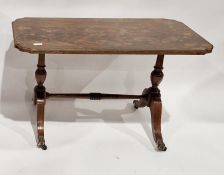Reproduction figured stained wood and gilded coffee table having shaped corners, on turned supports,