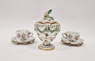 Two Meissen flower encrusted cabinet cups and saucers and a Continental porcelain lobed vase and