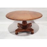 Victorian tilt-top breakfast table, circular with single baluster support quadruped base on bun feet