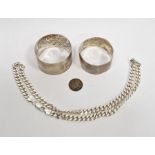 Silver chain necklace, 1g approx. and two silver napkin rings both name inscribed, 1g total (3)