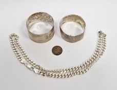 Silver chain necklace, 1g approx. and two silver napkin rings both name inscribed, 1g total (3)