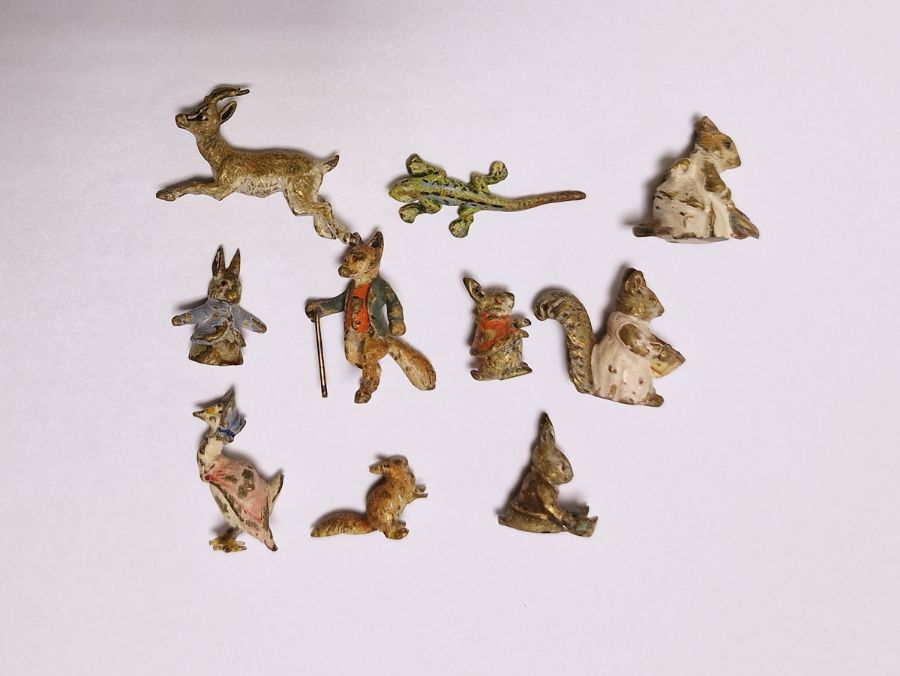 Beatrix Potter cold painted miniatures; Peter Rabbit, Jemima Puddleduck, Mr. Todd also other