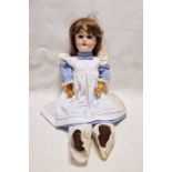 Schoenau & Hoffmeister bisque headed doll with sleeping blue eyes, open mouth, ball jointed