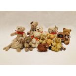Three various early 20th century miniature plush teddy bears, one possibly with bottle interior,