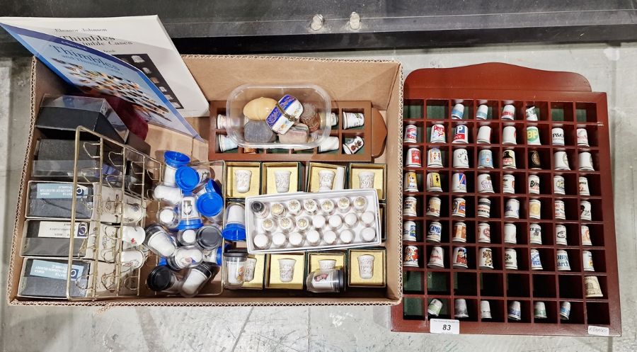 Large collection of porcelain and metal commemorative thimbles including a silver thimble hallmarked