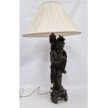 Carved wooden table lamp in the form of an oriental figure