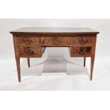 20th century figured mahogany kneehole desk with leather inset top, five short drawers around the