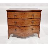 George III mahogany serpentine-fronted chest of three graduated drawers with circular brass