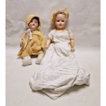Armand Marseille 390 A10M bisque headed doll, cracks to face, composite body, 71cm approx. and an