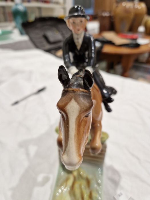 Beswick pottery model of a horse and rider jumping a fence, printed black marks, the female rider - Image 14 of 17