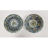 Pair of antique continental tin-glazed earthenware shallow dishes with geometric decoration in
