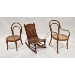 Child's bentwood and cane-seated chair, another child's bentwood cane-seated armchair and a child'