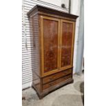 James Shoolbred, London, Edwardian mahogany wardrobe with floral, scroll and griffin inlaid