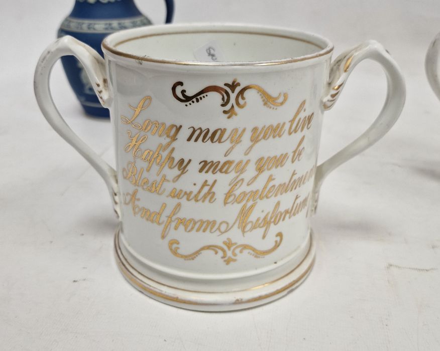 Pair of 19th century English porcelain two-handled motto loving cups, each painted with flowers, - Image 2 of 5