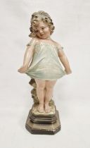 Early to mid-20th century painted plaster figure of a Shy Girl, incised 114 to reverse, modelled