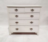 White painted oak chest of drawers with rectangular moulded top, above two short drawers, above