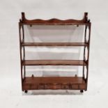 Mahogany wall-hanging shelving unit with three shelves and three drawers 92cms h. x 69 x 16.5