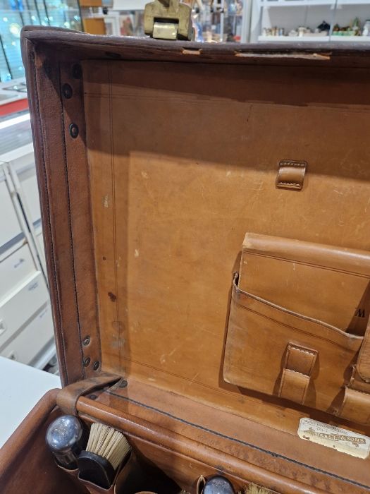 Large leather suitcase with part fitted interior of bottles, brushes, mirrors, etc, with name plaque - Image 25 of 32