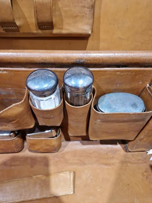 Large leather suitcase with part fitted interior of bottles, brushes, mirrors, etc, with name plaque - Image 20 of 32
