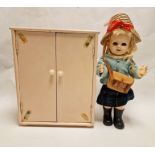 1950s/60s Pedigree schoolgirl doll with satchel and a painted wood wardrobe with clothes