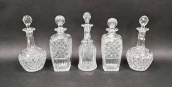 Victorian bell-shaped decanter, a pair of early 20th century baluster-shaped cut glass decanters and