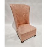 Edwardian Arts & Crafts-style nursing chair with high back, pink upholstery