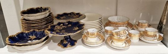 Early 19th century English porcelain part-tea and coffee service with apricot and gilt borders,