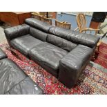 Natuzzi black leather sofa unit comprising of two chairs, one 116cm wide and one 100cm wide approx.