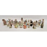 Twenty-nine Beswick Beatrix Potter figures, 20th century, printed brown and gilt mark for F. Warne &