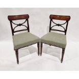Set of four mahogany slatback dining chairs with green upholstered seats and another three with