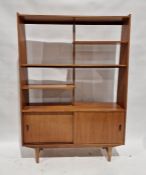 20th century teak wall unit with shelves above sliding doors, on tapering supports Condition