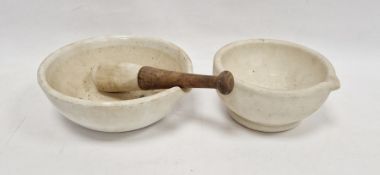 White stoneware mortar and pestle with wooden handle and another ceramic mortar Condition