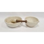 White stoneware mortar and pestle with wooden handle and another ceramic mortar Condition