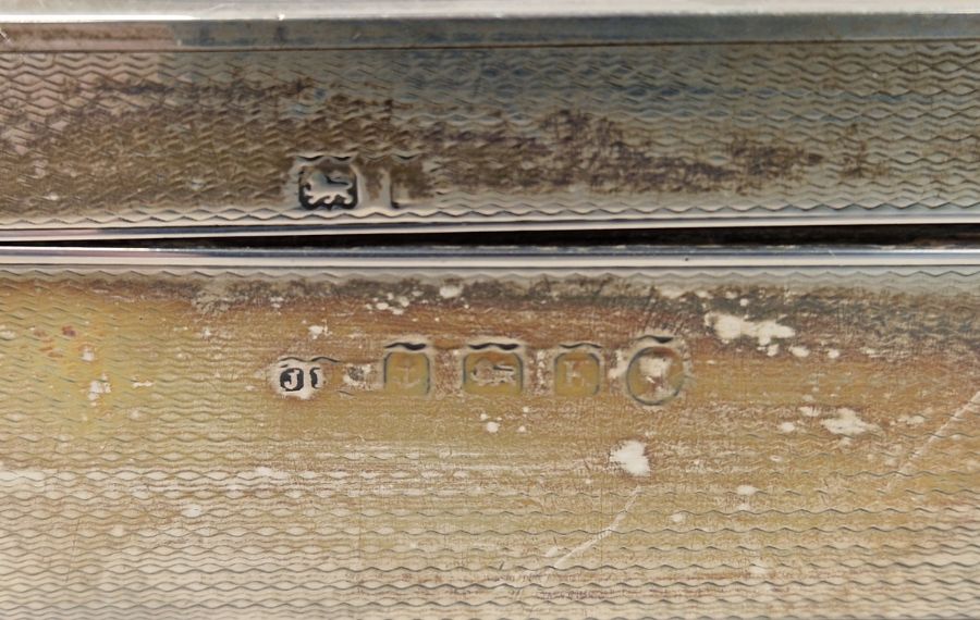 1930's silver-mounted rectangular cigarette box, Birmingham 1934, engine-turned (worn), 17cm x 4cm - Image 2 of 2