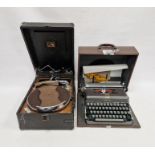 Imperial typewriter in grey, with brown carrying case and His Master's Voice portable gramophone