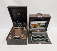 Imperial typewriter in grey, with brown carrying case and His Master's Voice portable gramophone