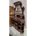 Edwardian mahogany mirror-backed sideboard with scroll shaped shelf flanked by baluster supports and