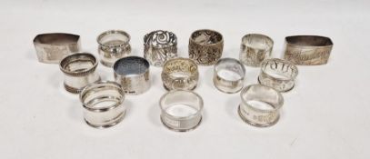 Fourteen assorted silver and silver-coloured napkin rings, various patterns, 9ozt total approx. (14)