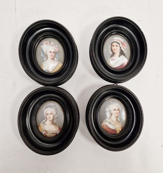 Four Continental porcelain Berlin style oval portrait plaques, each printed and painted with an 18th