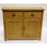 Modern Wiltshire light oak sideboard with two drawers and cupboards below, on straight supports