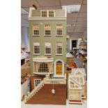 Large Georgian-style painted Anglesey wood dolls house with conservatory, orangery, flight of steps,