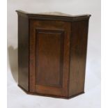 Oak hanging corner cupboard with framed panel door Condition ReportH. 77cm x W. 70 x D. 50cm