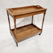 Light oak two-handled afternoon tea trolley on wheeled stand, with undertier, on castors, 78 x  82cm
