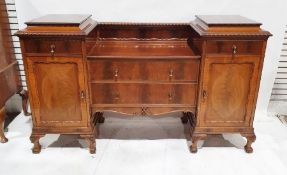 20th century mahogany sideboard with gadrooned carved borders, two panelled cupboard doors below two