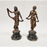 Two copper finish cast metal figures of maidens (2)