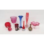 Group of engraved and coloured glassware to include an amethyst tinted goblet on clear stem etched